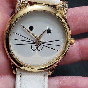 White and gold tone kitty face watch